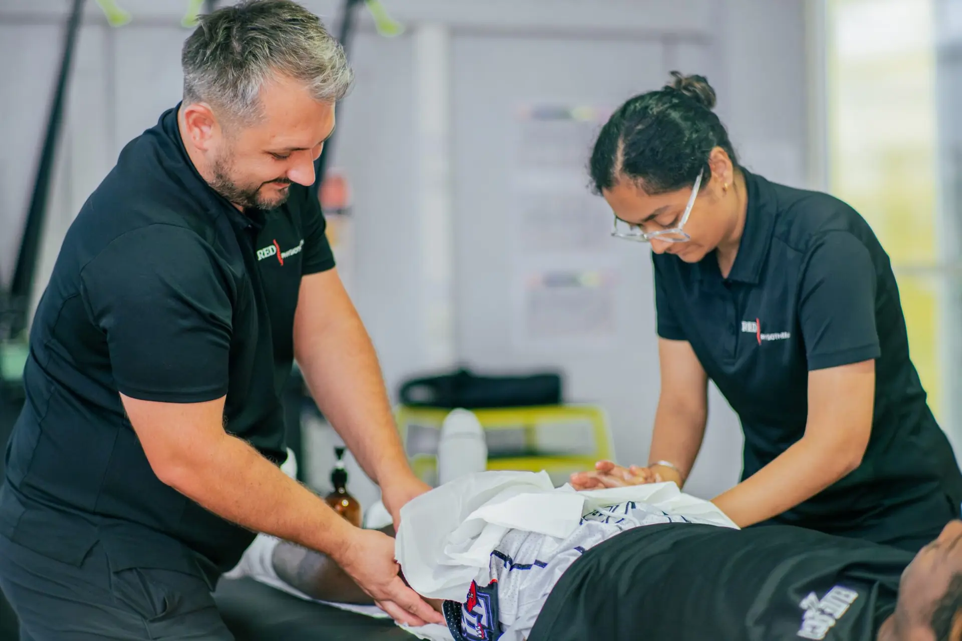RED Physiotherapy team providing hands-on treatment